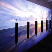 The \"Approach to Time.\" installation designed by Takt Project involves 12 acrylic objects and stunning movie footage projected on the screen behind. | GRAND SEIKO