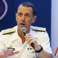 Chief of Naval Operations Adm. John Richardson confirms Monday at a news conference in Quezon City, Philippines, that the U.S. Navy will continue patrolling the South China Sea even after a Chinese destroyer came dangerously close to one of its ships during a \"freedom of navigation\" operation this month near a disputed reef. | AP
