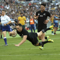 New Zealand\'s Ben Smith scores the All Blacks fourth try against the Wallabies during their Bledisloe Cup test in Yokohama on Saturday afternoon. | AP