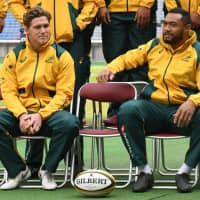 Australia captain Michael Hooper (left)and teammate Sekope Kepu attend a photo session prior to the captain\'s run in Yokohama on Friday ahead of the Wallabies\' Bledisloe Cup match against New Zealand on Saturday. | AFP-JIJI