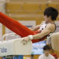 Kohei Uchimura is seen on the pommel horse during a recent workout at the National Training Center. | KYODO