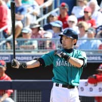 Ichiro Suzuki, seen batting in a spring training game this year, is expected to serve as a Mariners player and coach when spring training begins next February. | KYODO