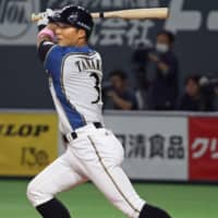 The Fighters\' Kensuke Tanaka strokes a tiebreaking single in the first inning against the Marines on Thursday at Sapporo Dome. Hokkaido Nippon Ham edged Chiba Lotte 5-4. | KYODO