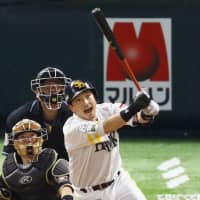 Hawks third baseman Nobuhiro Matsuda reacts after hitting a fourth inning home run against the Fighters in Game 3 of the Pacific League Climax Series First Stage. | KYODO