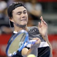 Taro Daniel competes against Stefanos Tsitsipas in a first-round men\'s singles match at the Rakuten Japan Open on Tuesday at Musashino Forest Sport Plaza. Daniel lost 6-1, 6-3. | KYODO