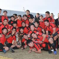 The Hokkaido Barbarians men\'s team poses after winning the 2017 East Japan Club Championship. | HOKKAIDO BARBARIANS / VIA KYODO