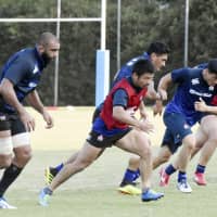 The Brave Blossoms train in Miyazaki on Oct. 18 ahead of their upcoming tests against a World XV and New Zealand. | KYODO