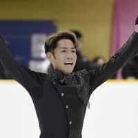 Daisuke Takahashi reacts after completing his free program at the Kinki Championship on Sunday in Amagasaki, Hyogo Prefecture. | KYODO
