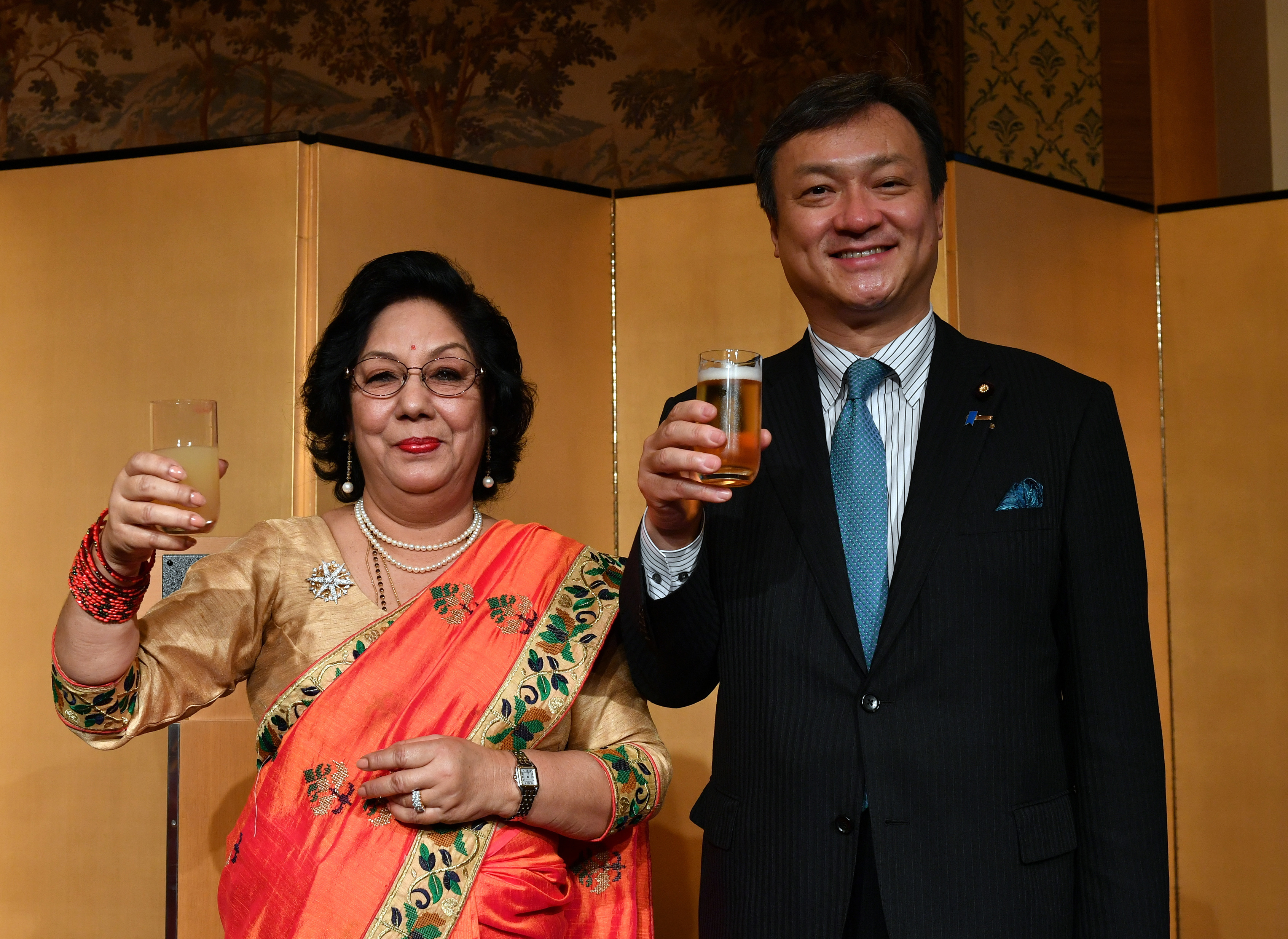 Nepalese Ambassador Prativa Rana poses for a photo with Parliamentary Vice-Minister for Foreign Affairs Iwao Horii during a reception to celebrate Nepal's national day at Hotel Okura Tokyo on Sept. 21. |    YOSHIAKI MIURA
