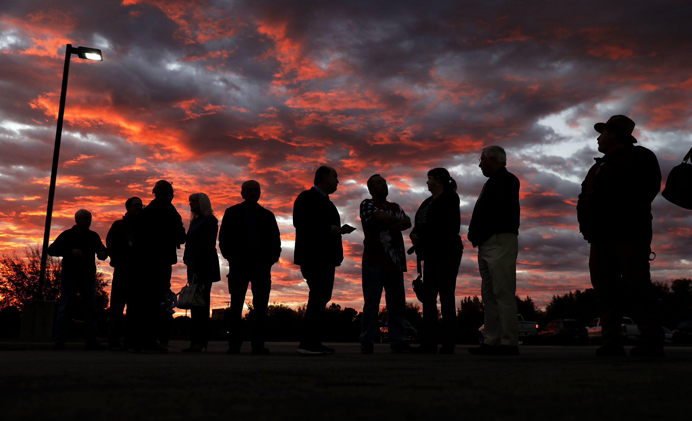 Voters line up to cast their ballots shortly before the polls open in the midterm elections at First Church in Owasso, Oklahoma, on Tuesday.