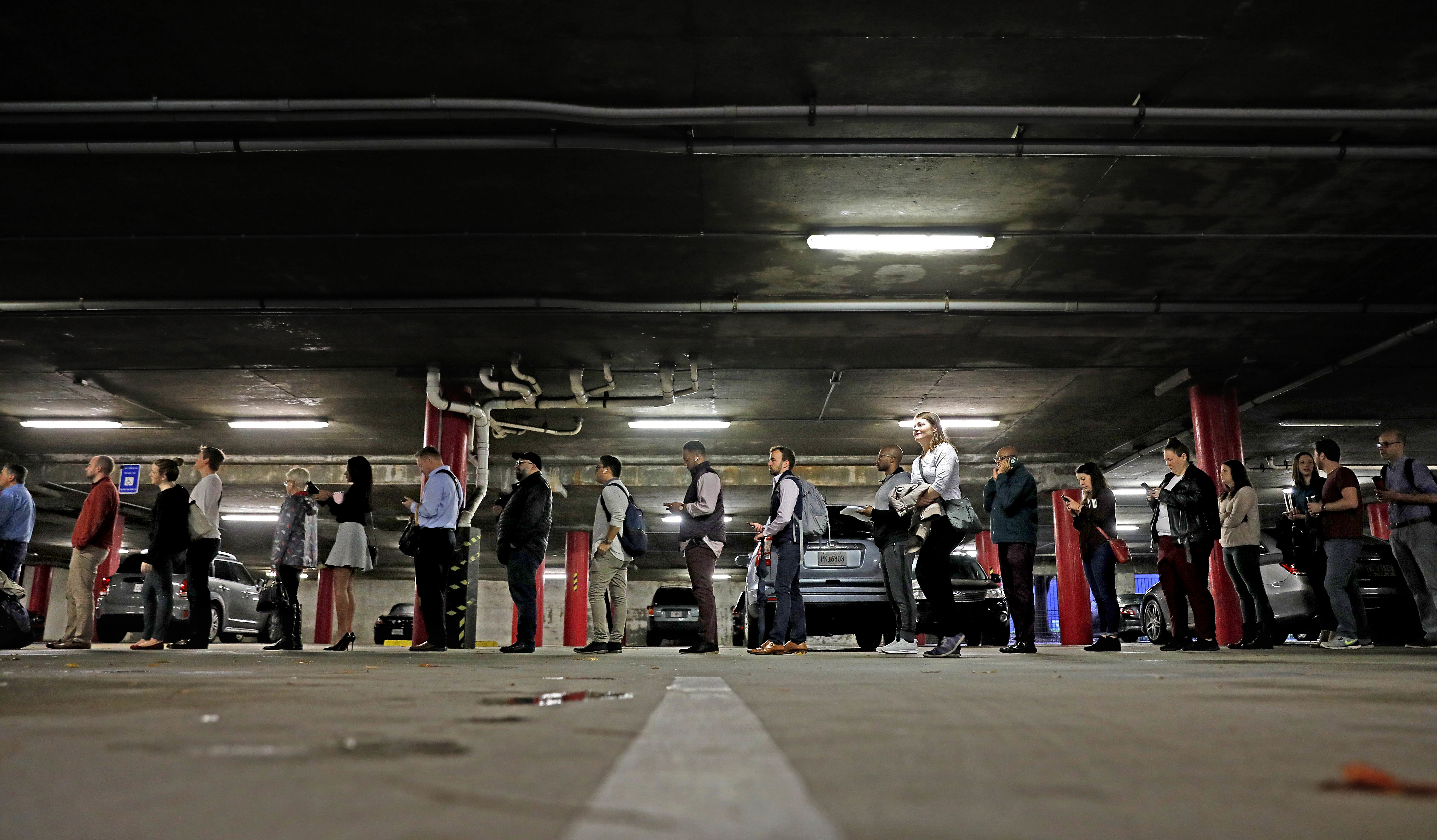 A line of voters backs up into a parking garage outside a polling site on Election Day in Atlanta on Tuesday.