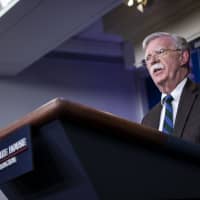 John Bolton, national security adviser, speaks during a White House briefing in Washington Tuesday. President Donald Trump said he may try to eliminate electric car subsidies for General Motors Co. after it announced it will close factories and lay off thousands of U.S. workers. | BLOOMBERG