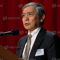 Bank of Japan Gov. Haruhiko Kuroda speaks at the Paris Europlace International Financial Forum in Tokyo on Monday. | REUTERS