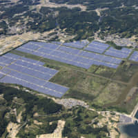 A major solar power plant, a project involving General Electric Co., is seen in the city of Setouchi, Okayama Prefecture, in May. | SETOUCHI FUTURE CREATIONS LLC / VIA KYODO