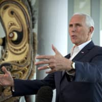 U.S. Vice President Mike Pence speaks during an informal news conference at APEC Haus in Port Moresby on Sunday. | AP