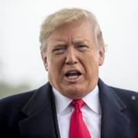 President Donald Trump speaks to reporters about a shooting at a Pittsburgh synagogue at Andrews Air Force Base, Maryland, Oct. 27. Trump has astonished legal scholars with his claim that he can end birthright citizenship with a swipe of his pen. | AP
