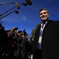 CNN\'s Jim Acosta speaks to journalists on the North Lawn upon returning to the White House in Washington on Friday. | AP