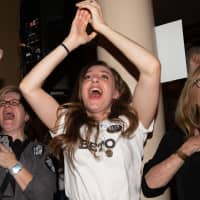 Women watch election results at the Texas Democrats Election Night Party in Austin on Tuesday. | AFP-JIJI