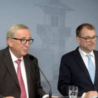 EU Commission President Jean-Claude Juncker and Finnish Prime Minister Juha Sipila (right) attend a news conference at the Prime Minister\'s official residence Kesaranta in Helsinki Thursday. | LEHTIKUVA / VESA MOILANEN / VIA REUTERS