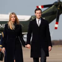 White House senior advisers Ivanka Trump and her husband, Jared Kushner, walk to Air Force One on route to visit Pittsburgh after mass shooting at synagogue as they depart with U.S. President Donald Trump at Joint Base Andrews, Maryland, Tuesday. | REUTERS