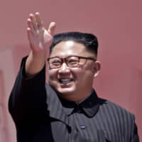 North Korean leader Kim Jong Un waves after a parade for the 70th anniversary of North Korea\'s founding day in Pyongyang on Sept. 9. | AP