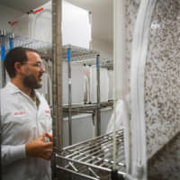 A project lead biologist speaks during an interview in the mosquito factory at the Verily Life Sciences lab in South San Francisco in October. | BLOOMBERG