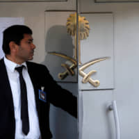 A member of the security staff stands at the entrance of the Saudi Arabian Consulate in Istanbul on Oct. 29. | REUTERS