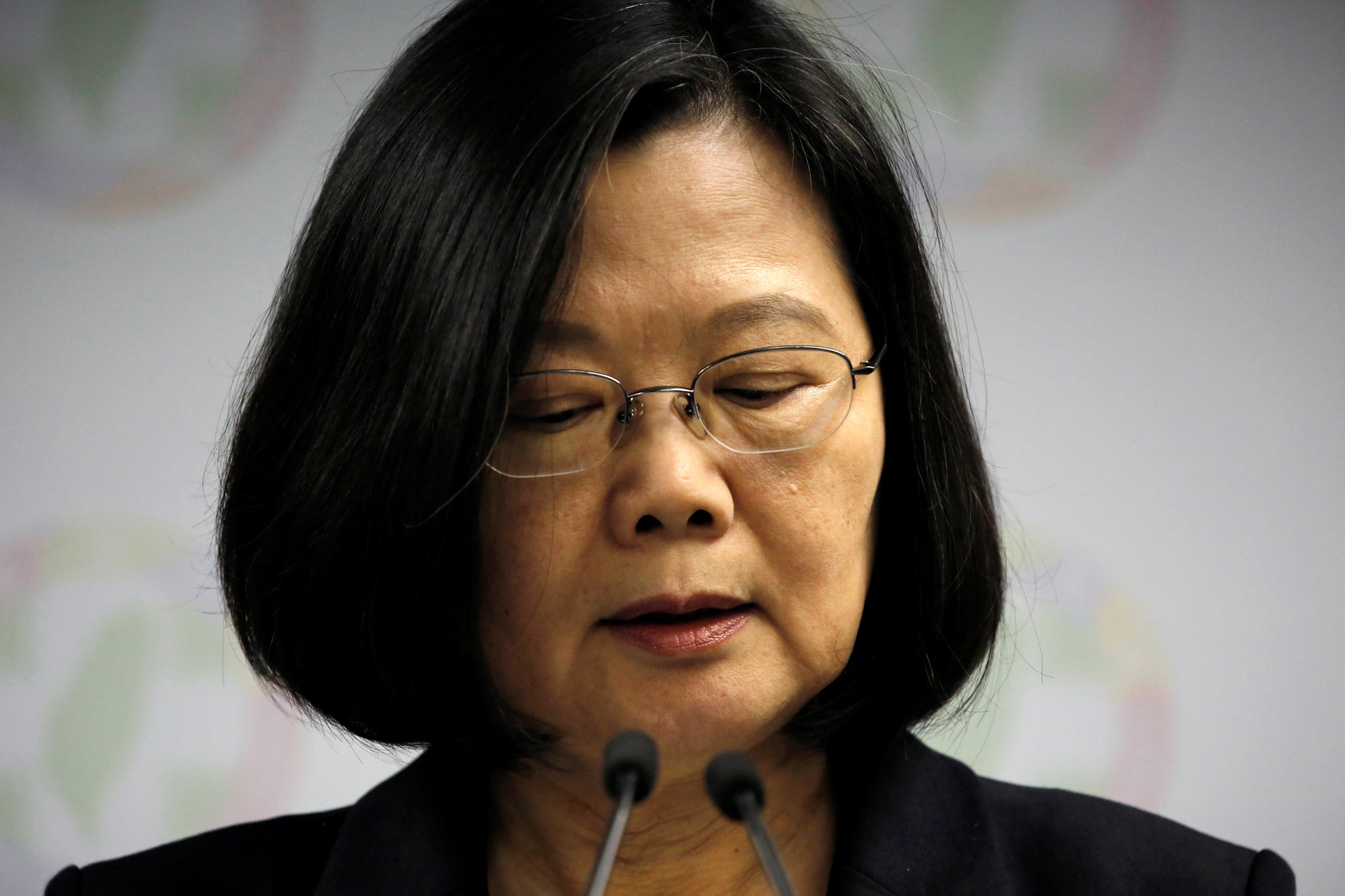 Taiwan President Tsai Ing-wen announces her resignation as chairwoman of the Democratic Progressive Party after local elections in Taipei on Saturday. | REUTERS