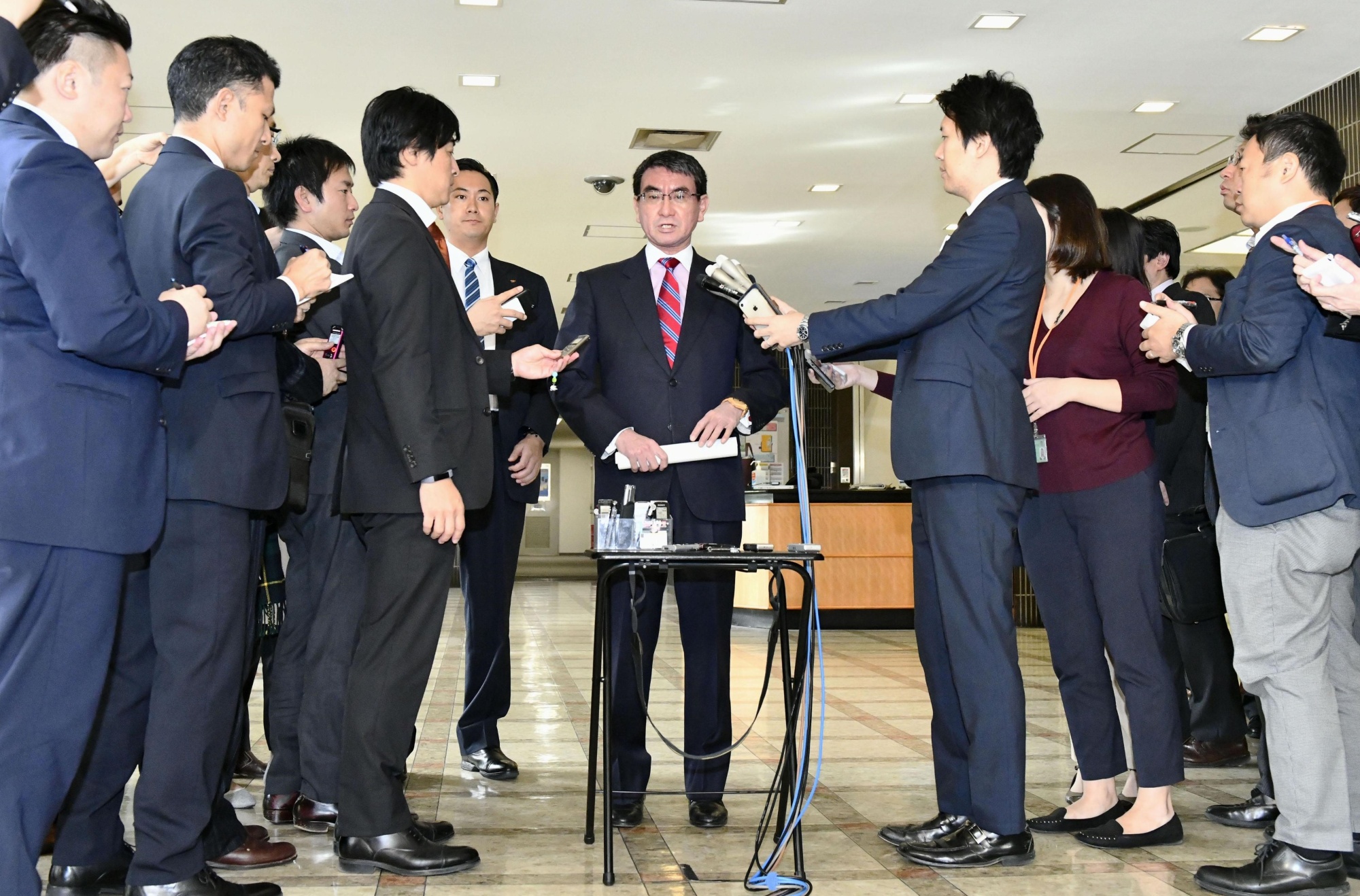 Foreign Minister Taro Kono speaks to reporters at the ministry in Tokyo on Wednesday. | KYODO