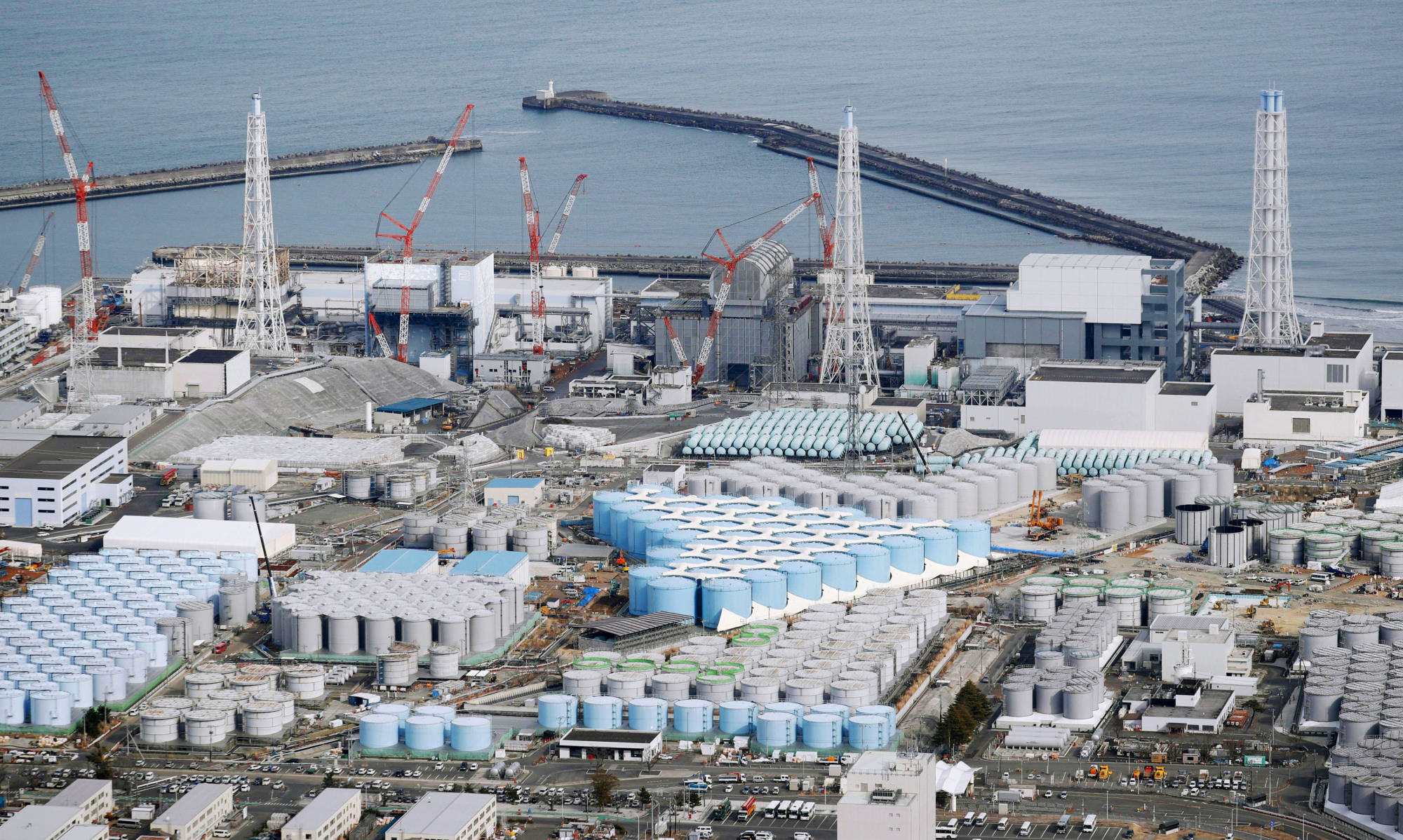 The growing number of tanks storing radioactive water at the Fukushima No. 1 plant can be seen in February. | KYODO