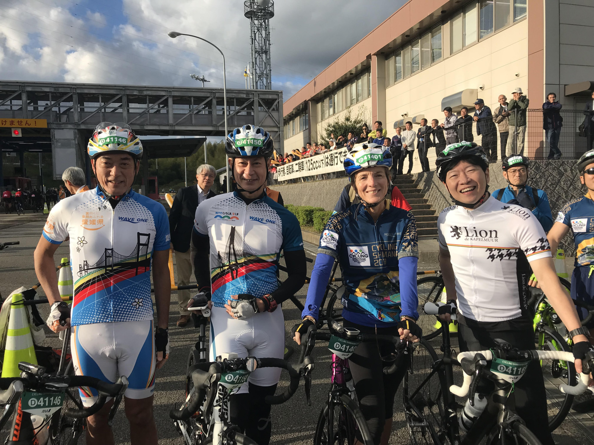 Former U.S. Ambassador to Japan Caroline Kennedy (second from right) poses with Ehime Gov. Tokihiro Nakamura (left), Hiroshima Gov. Hidehiko Yuzaki (second from left) and Okayama Gov. Ryuta Ibaragi during Cycling Shimanami 2018 on Oct. 28. | COURTESY OF CAROLINE KENNEDY