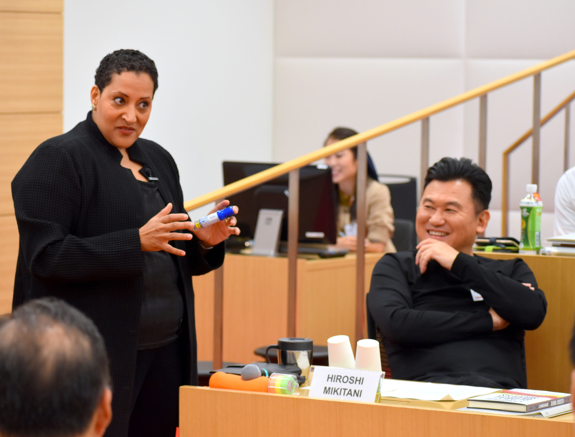 Hiroshi Mikitani, CEO of Rakuten Inc., listens to a lecture by Tsedal Neeley , a professor at Harvard Business School, in Tokyo on Oct. 24. | SATOKO KAWASAKI