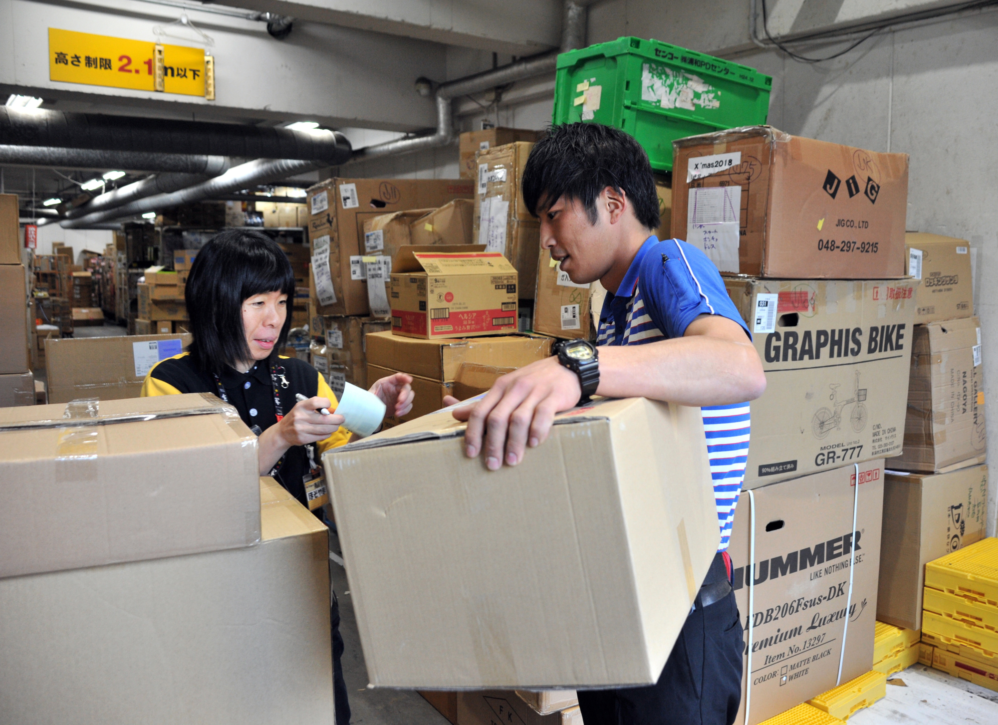 Keisuke Kawabe delivers a parcel to a store in Tokyo