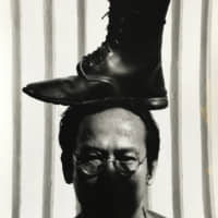 Vasan Sittiket\'s \"Top Boot on My Head\" (1993). | PHOTO BY MANIT SRIWANICHPOOM / COLLECTION OF THE ARTIST