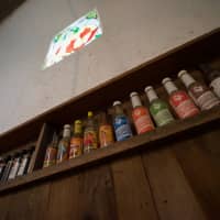 Pray to the spice gods: Mellow Habanero\'s \"cathedral\" to hot sauce, complete with a stained-glass-habanero window. | OSCAR BOYD