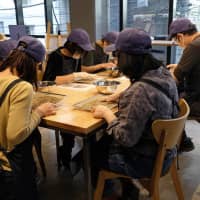 Intently focused: \"Members\" of Social Good Roasters\' coffee roasting program. | CLAIRE WILLIAMSON