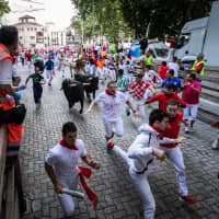 Nippon TV\'s \"Sekai no Hate Made Itte Q\" may have previously covered world-renowned festivals such as the running of the bulls in Pamplona, Spain, but questions have been raised about the veracity of other \"festivals\" that have appeared on the program, including a \"bridge festival\" in Laos. | GETTY IMAGES