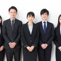 All in a row: The word \"hitonami\" means an alignment of people, one in which nobody really stands out. | GETTY IMAGES