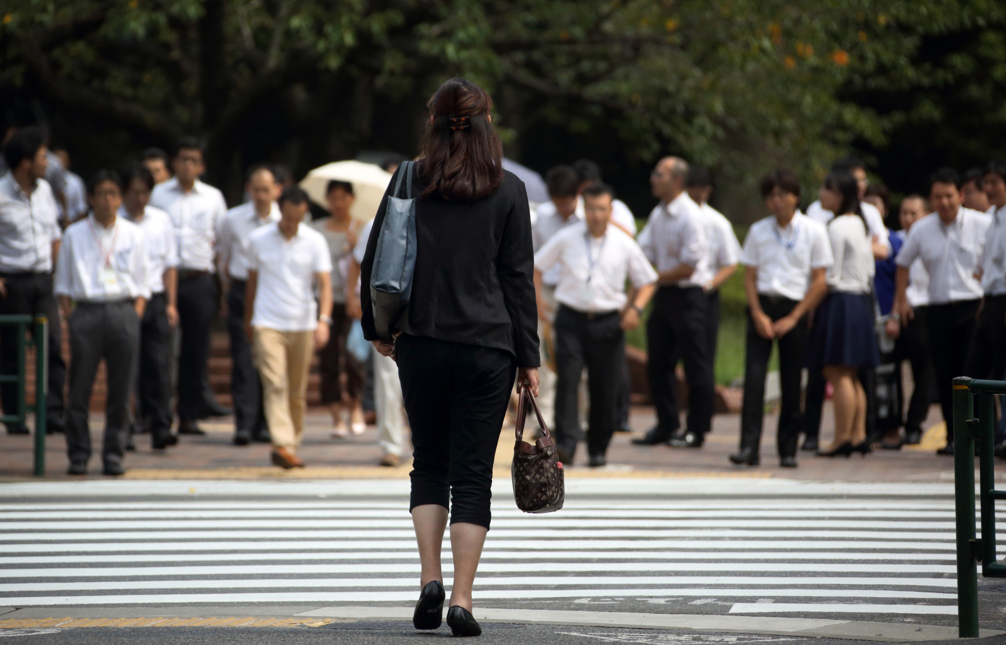 Expanding the participation of women in the workforce is one way Japan can enlarge its labor pool. | BLOOMBERG