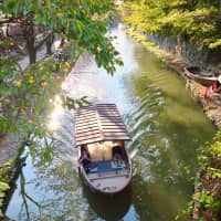 Boating to the biennale: A small boat sits in one of Omihachiman\'s many canals. | KATHERINE WHATLEY