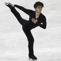 Shoma Uno performs his short program on Friday at Hiroshima Green Arena. Uno leads the men\'s competition with 92.49 points. | AP