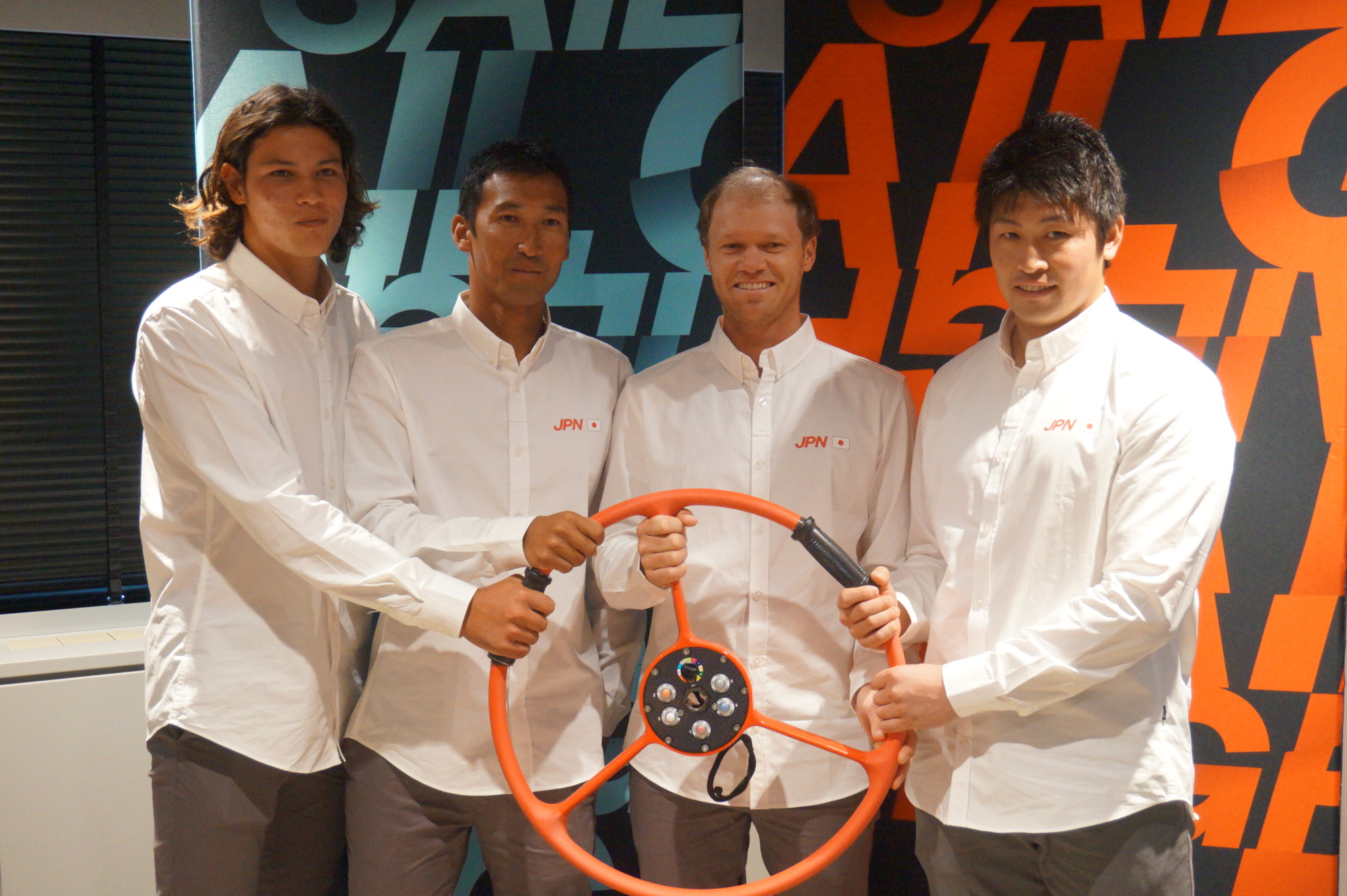 SailGP's Japan team members (from left) Leo Takahashi, Yugo Yoshida, Nathan Outteridge and Yuki Kasatani are seen at a news conference on Tuesday in Tokyo. | JASON COSKREY