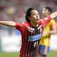 Consadole\'s Koji Miyoshi celebrates after scoring the game-winning goal against Vegalta on Sunday at Sapporo Dome. | KYODO