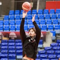 Forward Kosuke Takeuchi works on his shot during Japan\'s practice on Thursday in Toyama. The Akatsuki Five face Qatar in a World Cup Asian qualifier on Friday night. | KAZ NAGATSUKA
