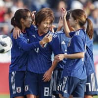 Mana Iwabuchi (second from left) celebrates after scoring her second goal of the day in Nadeshiko Japan\'s 4-1 friendly win over Norway on Sunday in Tottori. | KYODO