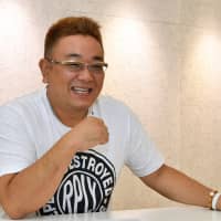 Comedian Mikio Date, one half of popular duo Sandwich Man, speaks during an interview with The Japan Times. | YOSHIAKI MIURA