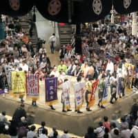 Kensho banners are displayed at a tournament at Ryogoku Kokugikan. | KYODO