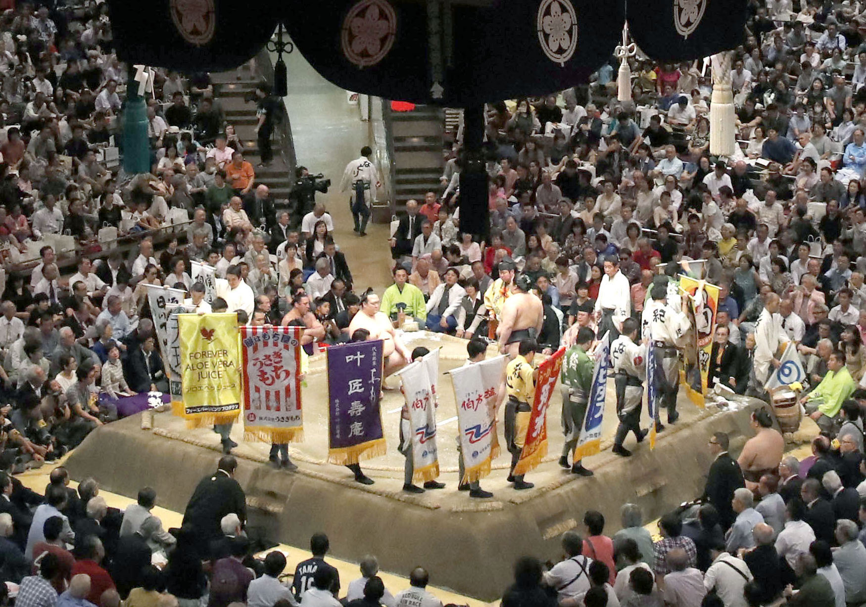 Kensho banners are displayed at a tournament at Ryogoku Kokugikan. | KYODO