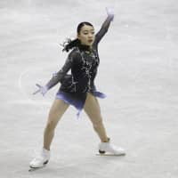 Rika Kihira performs her free skate routine at the NHK Trophy on Saturday. Kihira placed first with 224.31 points. | AP