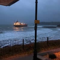 A Russian ship runs aground in Falmouth, Cornwall, Britain Tuesday in this photo obtained from social media. | TWITTER / @ALEXANDRIAPESIC / VIA REUTERS